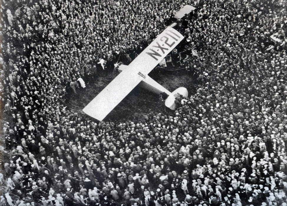 Charles Lindbergh lands in Paris, France